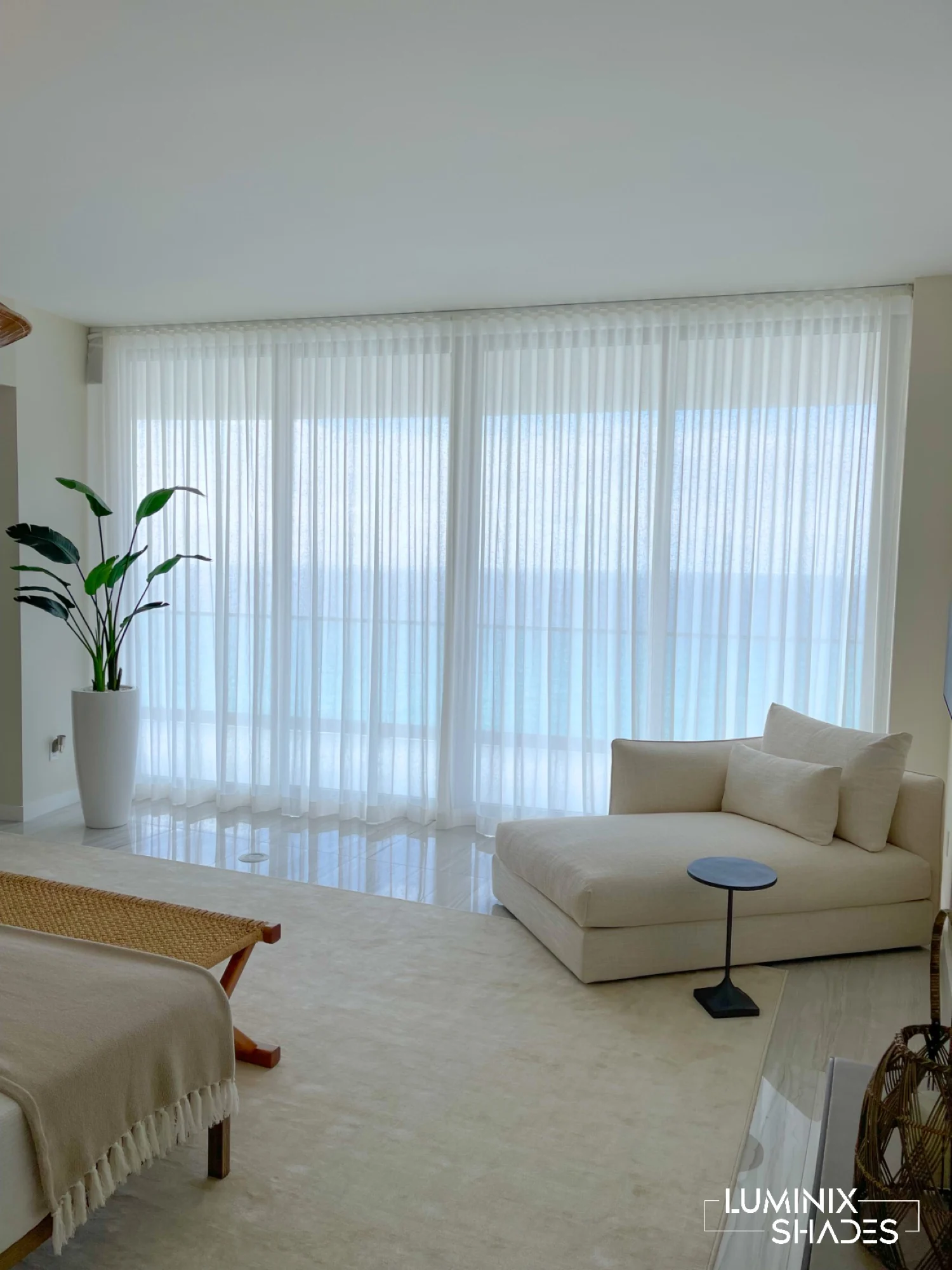 Custom sheer drapery in a waterfront living space